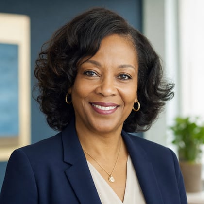 Angela Foster, an accounting-firm owner, smiling warmly