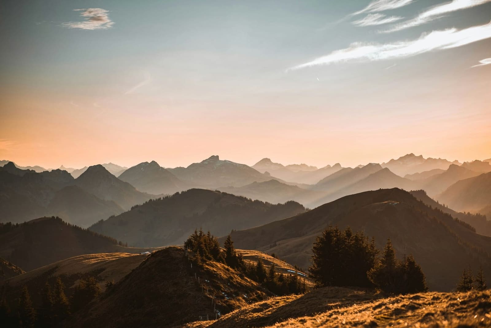 Snow-capped mountain range at dusk